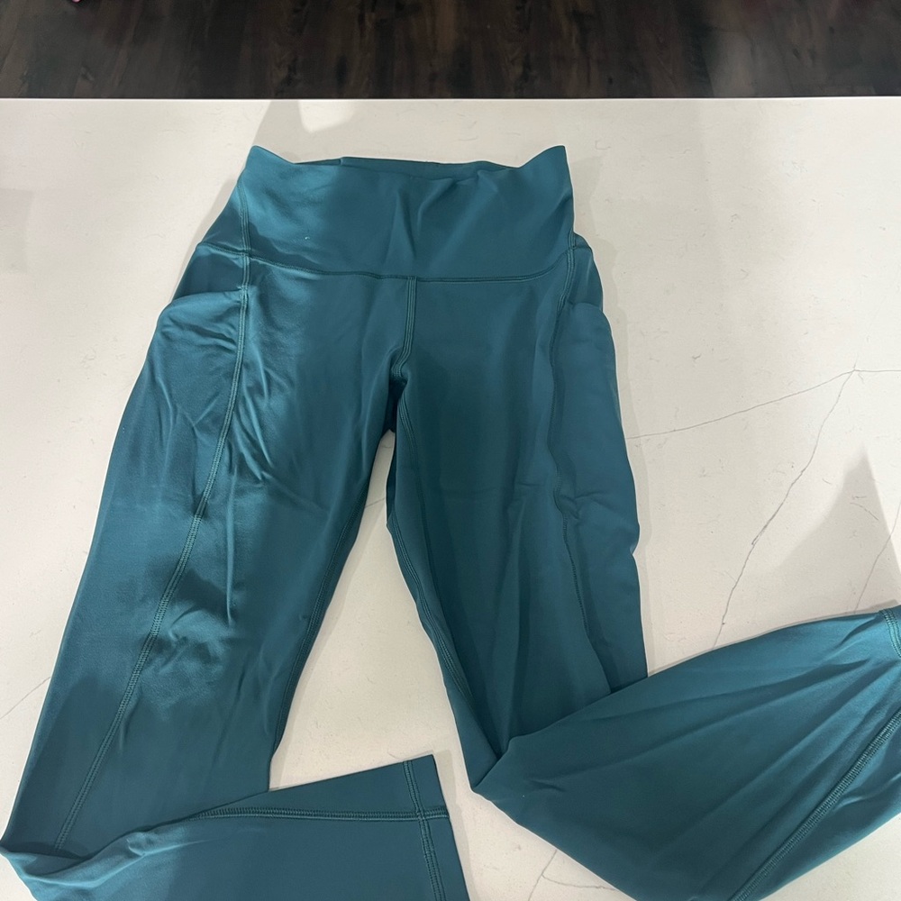 Teal green lululemon align leggings with pockets. Size 6 28 length.